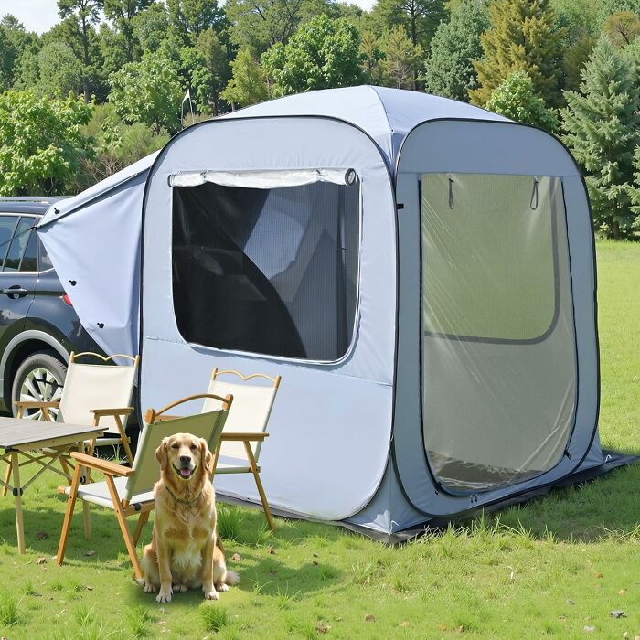 Grey pop-up tent attached to a car, with a golden retriever sitting outside, for outdoor and backyard summer adventures.