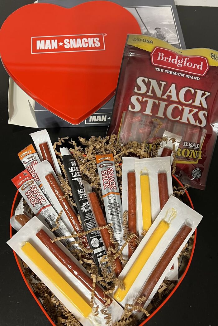 A heart-shaped box filled with various snack sticks and cheeses, perfect as a last minute Fathers Day gift.