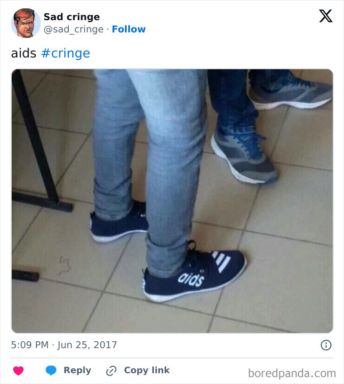 Someone wearing shoes with the word aids written on them, a cringy and incredibly sad fashion choice.