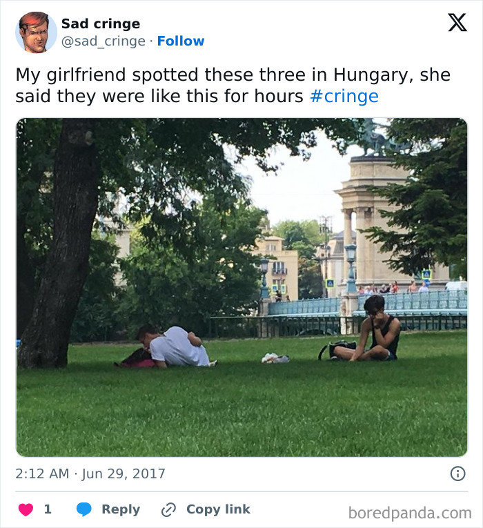 Cringy image of a couple cuddling in a park while a third person sits alone, incredibly sad content.