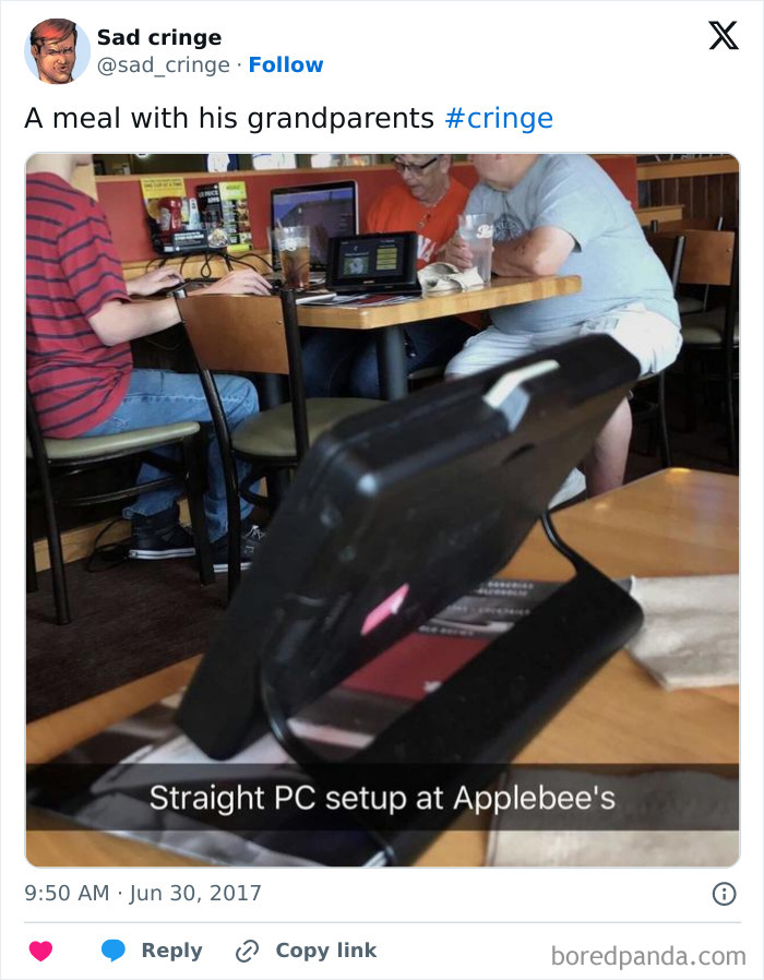 A person with a straight PC setup at Applebees, incredibly sad and cringy.