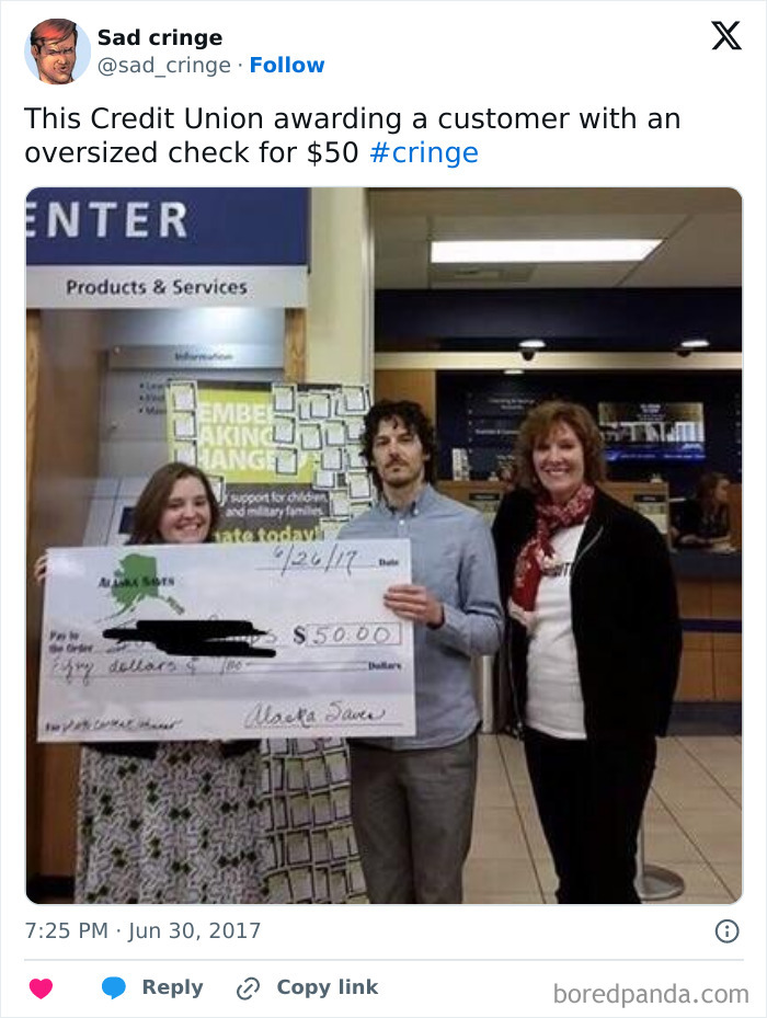 Three people holding an oversized check for $50 from a credit union, a cringy award ceremony.