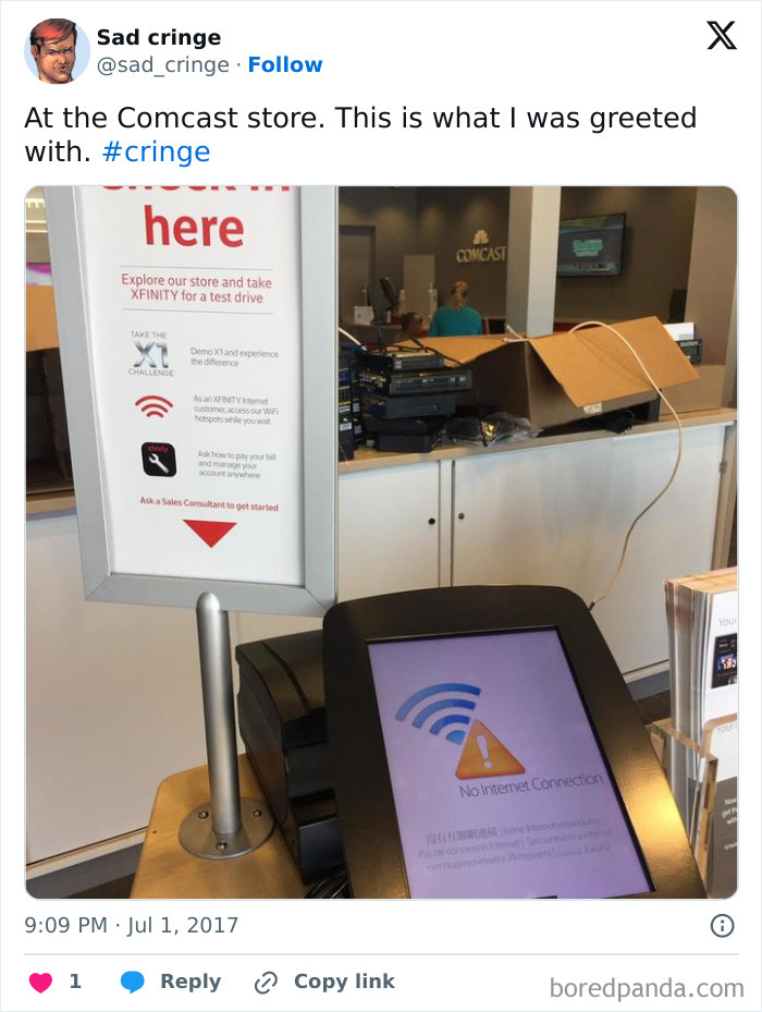A Comcast store with a No Internet Connection sign, incredibly sad and cringy.