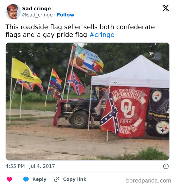 A roadside flag seller booth displaying both Confederate flags and a rainbow pride flag, a cringy mix of ideologies.