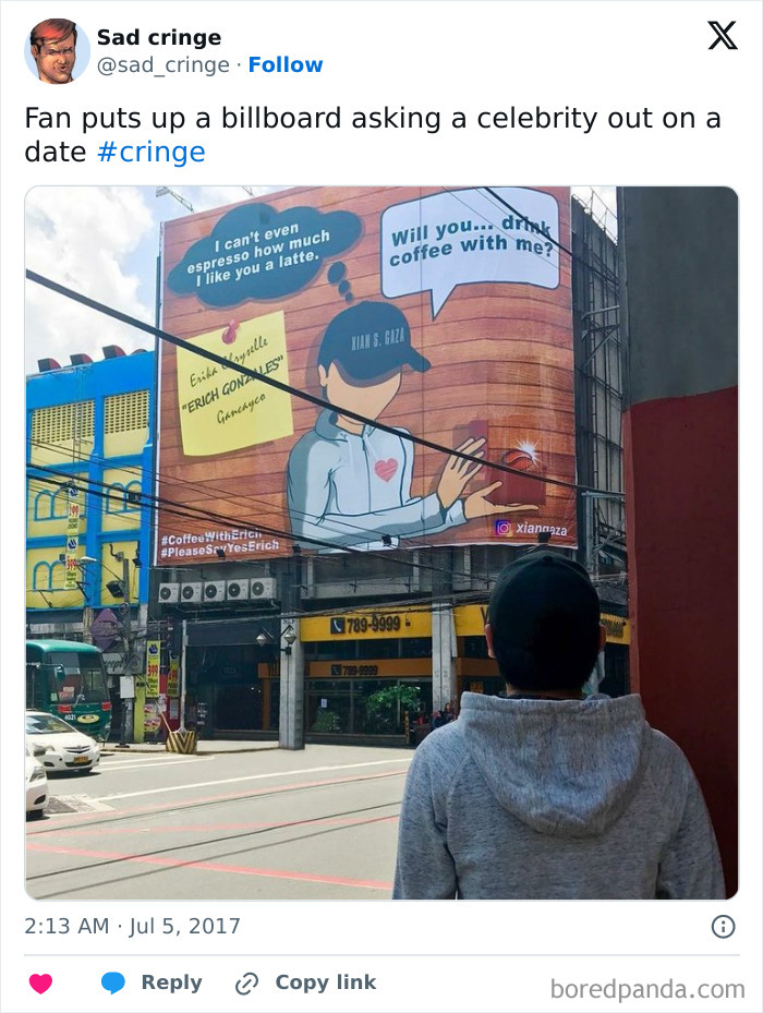 A person looking at a billboard with a drawing of a person asking a celebrity out on a date, an example of cringy content.