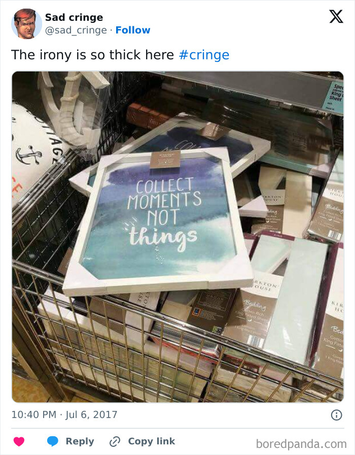 A cringy sign in a shopping cart that says Collect Moments Not Things, making people incredibly sad.