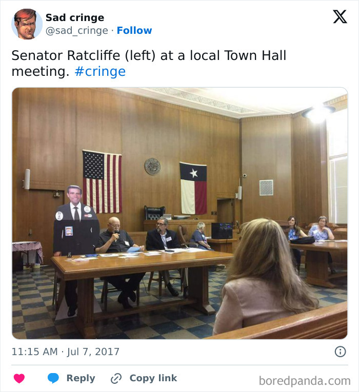 A cardboard cutout of Senator Ratcliffe at a local town hall meeting is incredibly sad cringe.