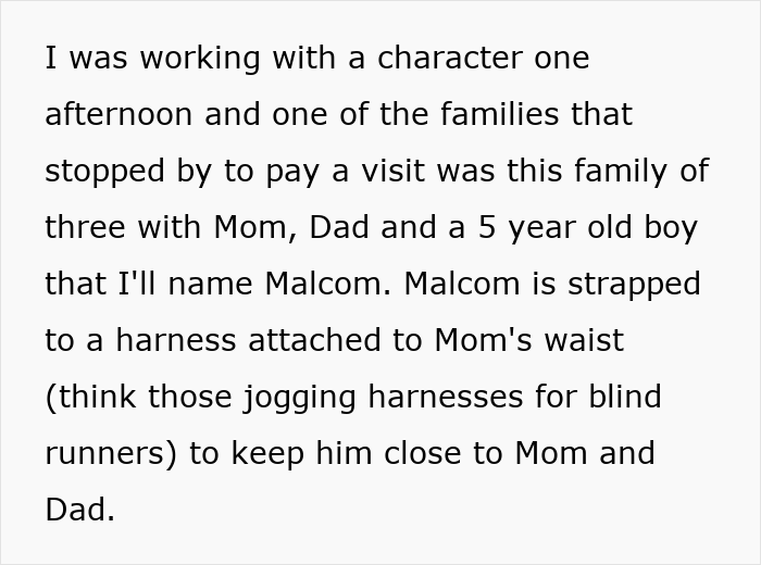 Text describing a boy strapped to a harness attached to mom's waist