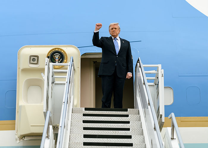 Trump raising fist on Air Force One stairs Trump raising fist on Air Force One stairs