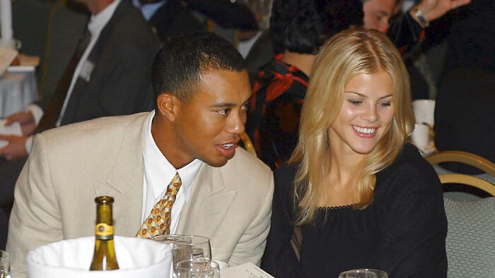 Tiger Woods and Elin Nordegren at an event, illustrating celebrity scandals.