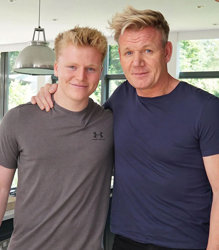 Gordon Ramsay and son Jack Ramsay smiling together, a famous dad-son duo who are clones of each other.