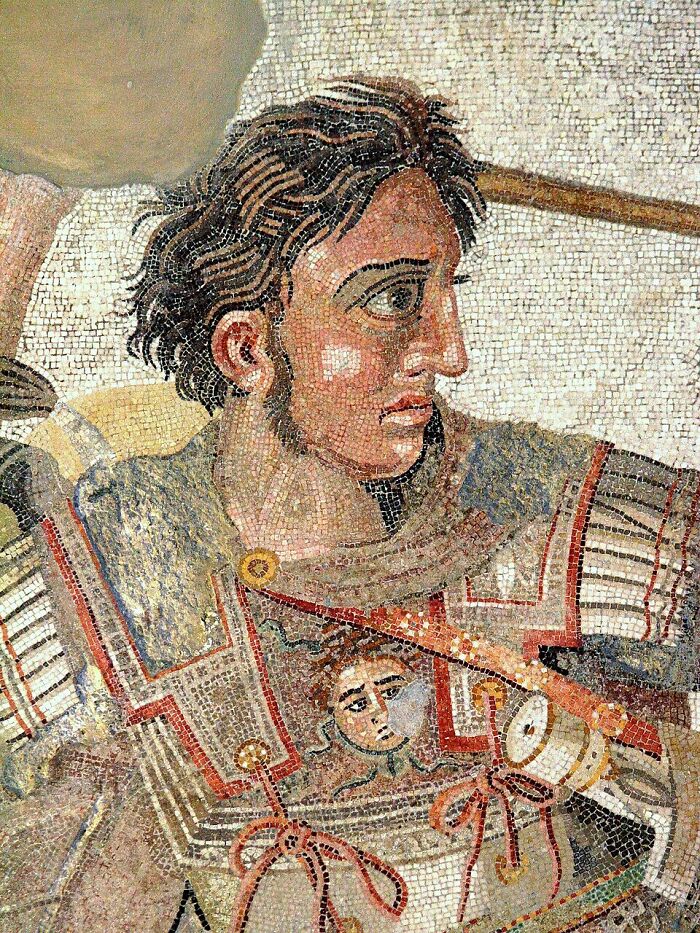 Ancient mosaic depicting a historical figure in armor representing brutal revenge acts