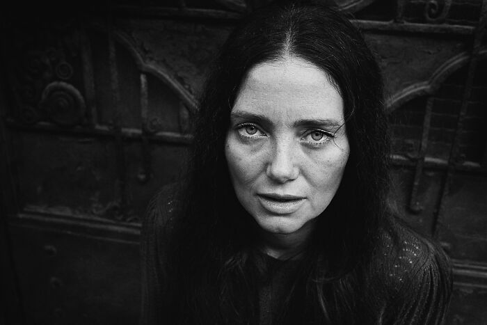 Black and white portrait capturing the raw beauty of the human spirit in a woman's eyes