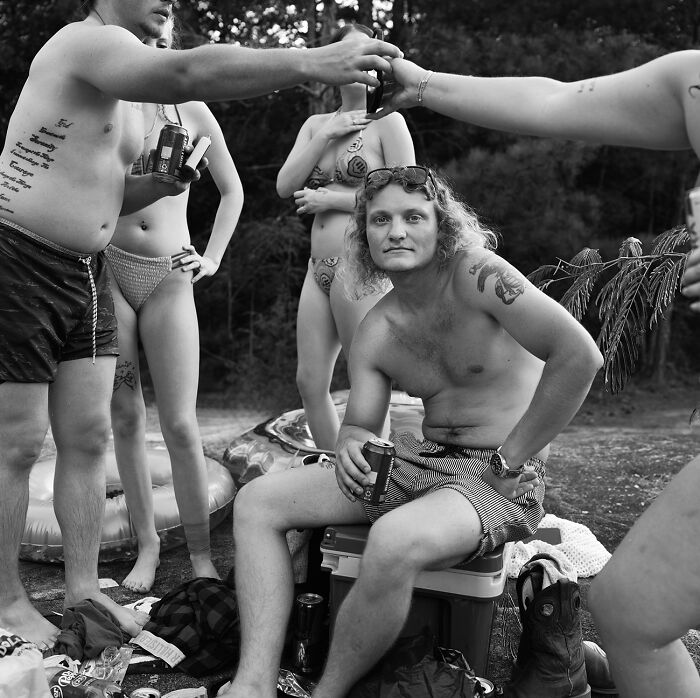 Black and white group portrait capturing raw beauty of the human spirit
