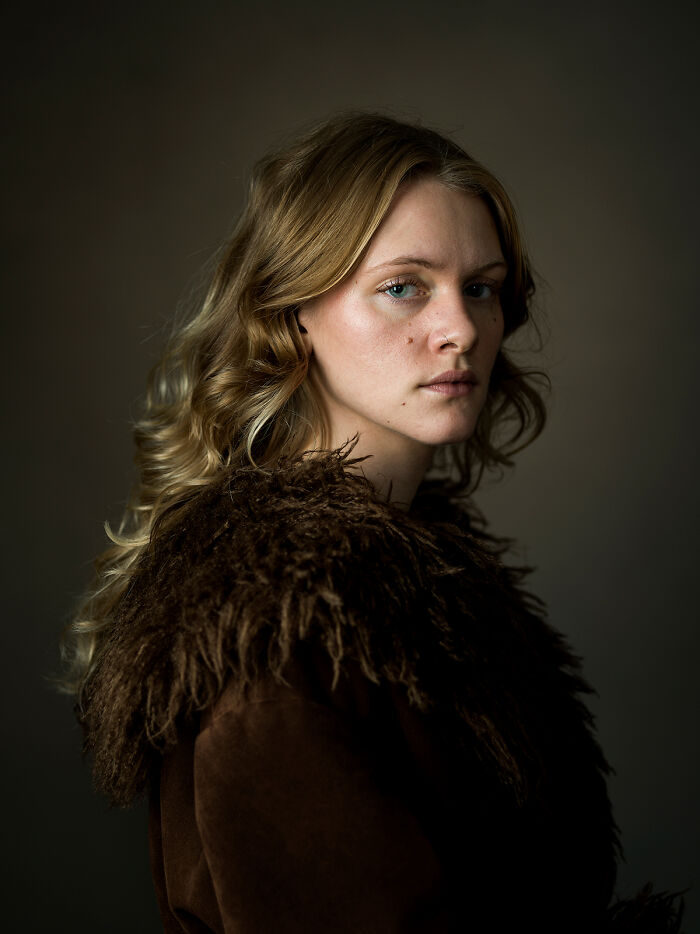 Portrait of a woman in fur coat illustrating raw beauty of the human spirit