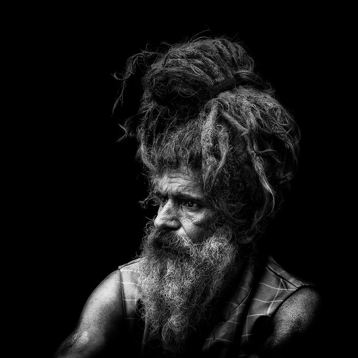 Black and white portrait of an elderly man with dreadlocks showing raw human spirit