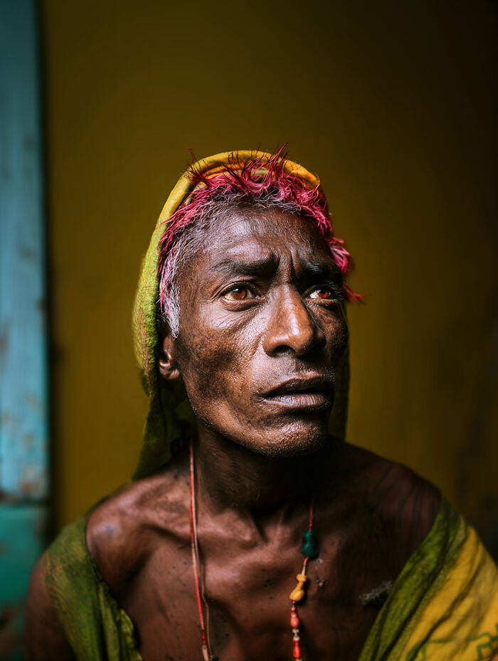 Portrait of a man with colorful hair showcasing raw beauty of the human spirit