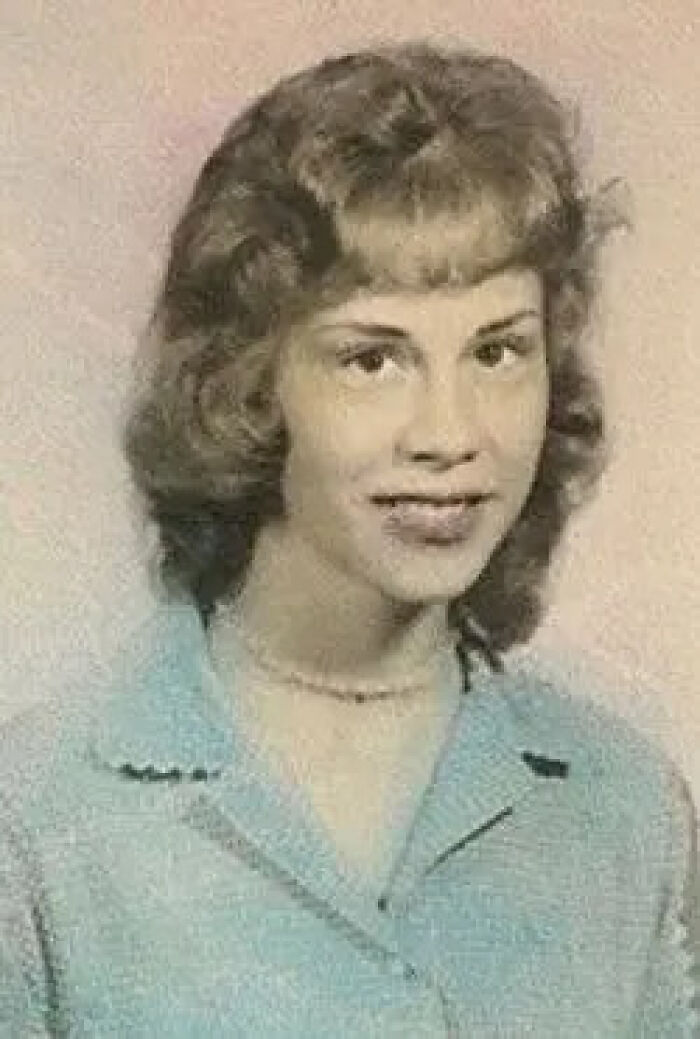 Vintage portrait of a young woman with a bob haircut and a light blue top, her disappearance was an unsolved mystery now solved.