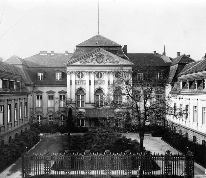 Black and white photo of a historic European palace linked to brutal revenge events