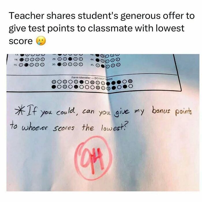 A student's test with a handwritten note to give bonus points to the lowest score, a soul-healing post.
