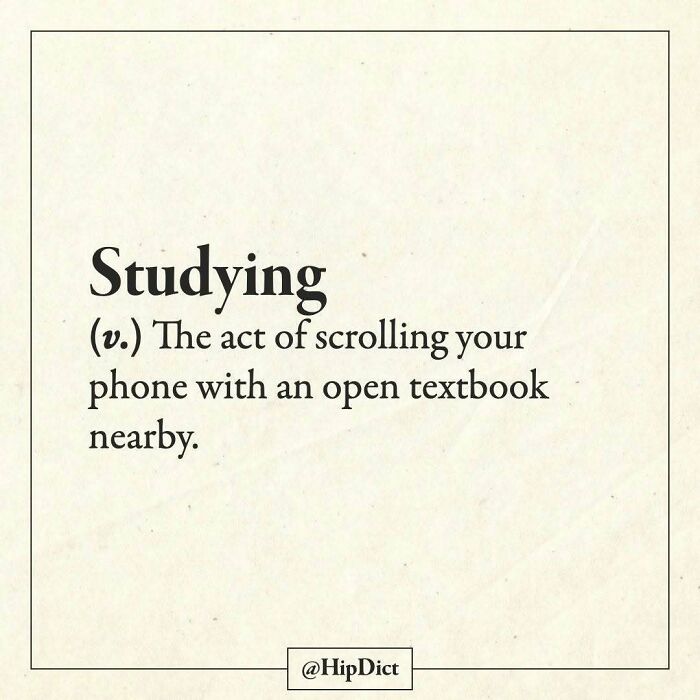 Studying defined as scrolling phone with an open textbook nearby