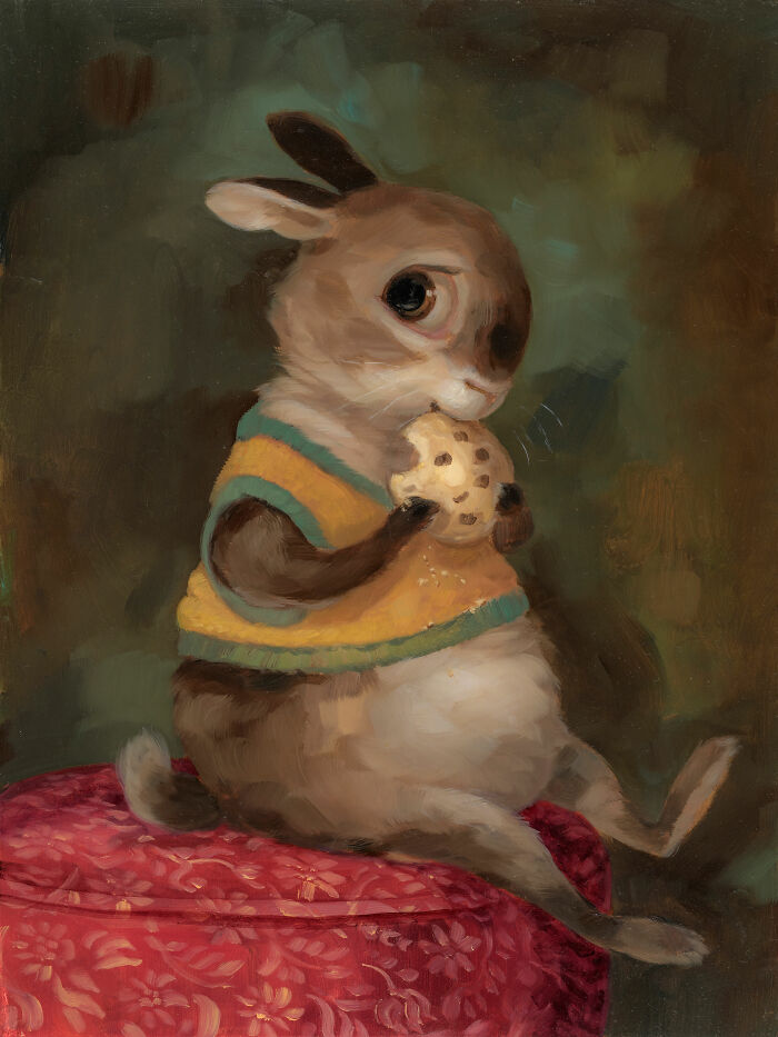 Cute animal painting of rabbit eating a cookie on a red cushion