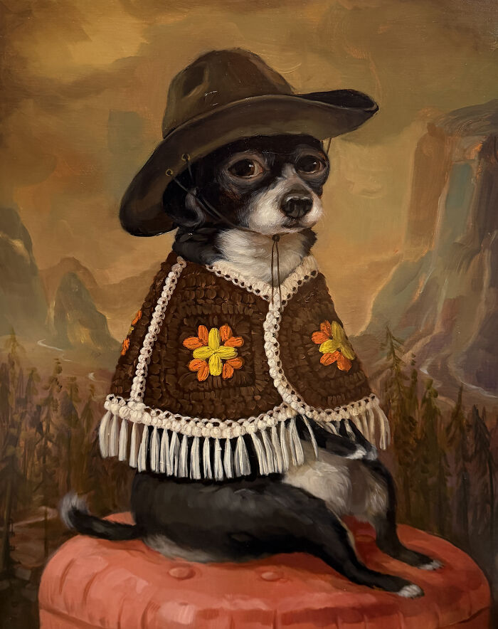 Adorable dog portrait wearing a decorated poncho and hat