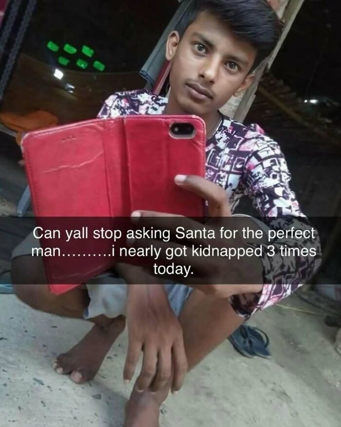 Young man selfie with text about Santa and kidnapping humor