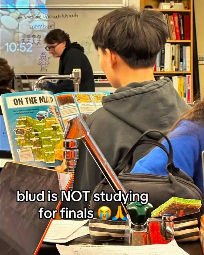Student reading a map with text saying not studying for finals