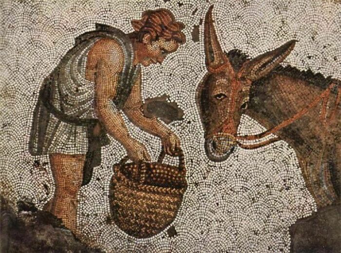 Mosaic artwork showing a man with a basket and a donkey historic treasure