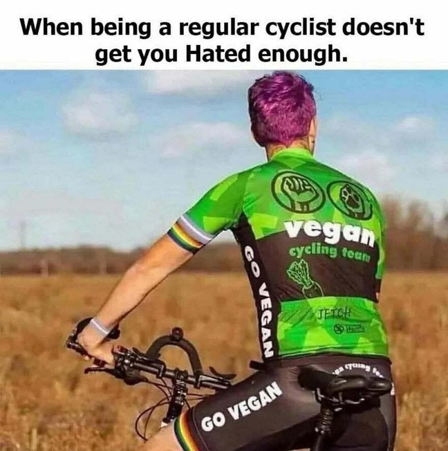 Cyclist wearing vegan cycling team outfit promoting go vegan message