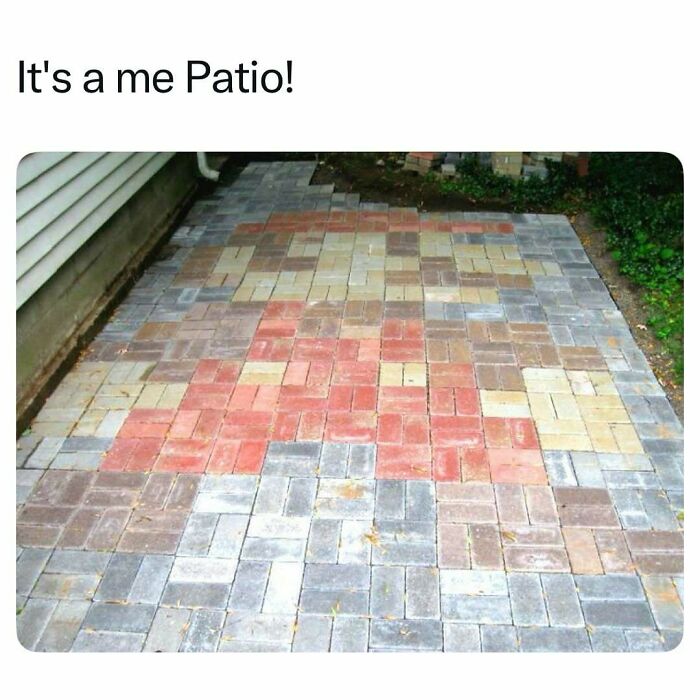 Patio designed with bricks forming a pixelated Mario character from the 1990s nostalgia.