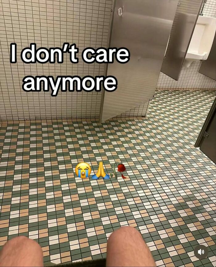 Bathroom floor with text overlay saying I don't care anymore with emojis funny humor