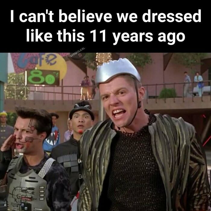Characters in futuristic costumes reflecting 1990s and 2000s nostalgia fashion