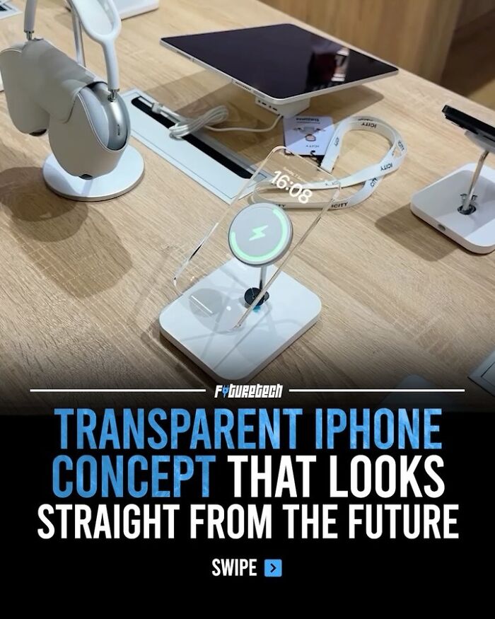 A transparent iPhone concept sits on a wooden table, showcasing future technology for smartphone design.