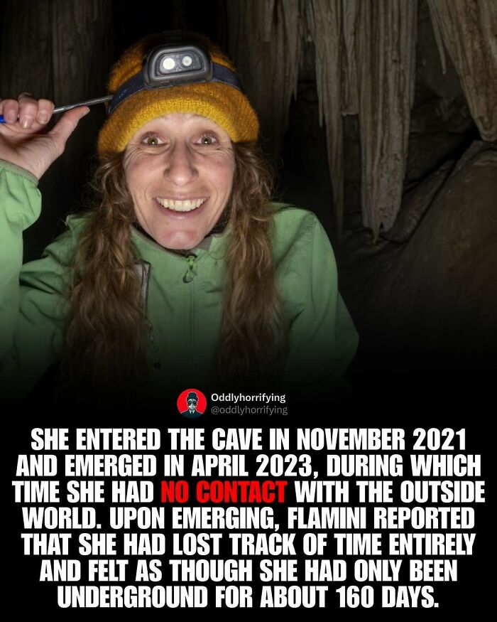 Smiling woman in a cave, her unsettling story of isolation is dark and depressing.