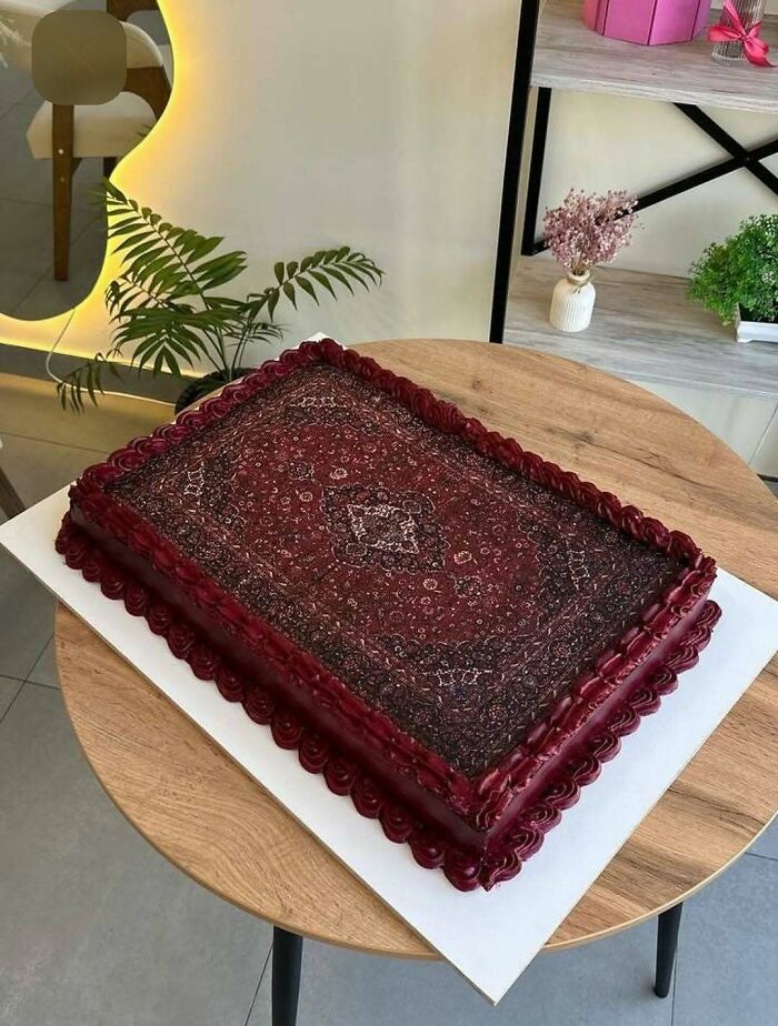 Cake decorated to look like a detailed Persian rug emphasizing creative cake designs
