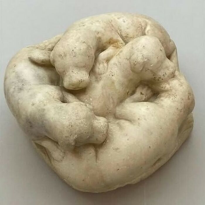 Marble sculpture of intertwined animals ancient historical treasure