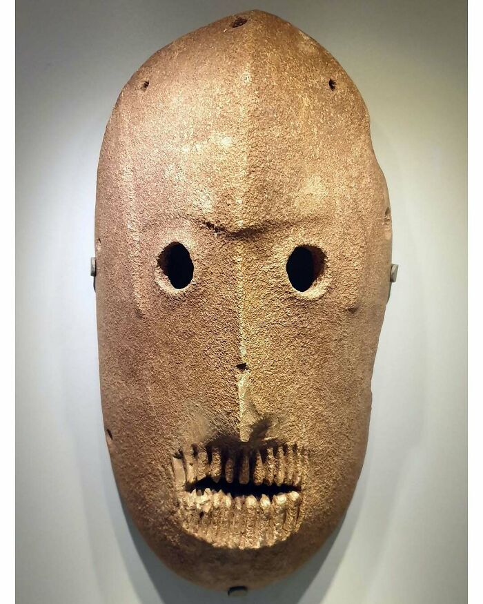 Ancient carved stone mask historical treasure from past civilizations