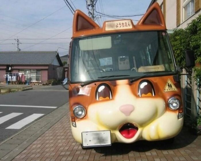 Bus designed to look like a cartoon cat face with large eyes and ears