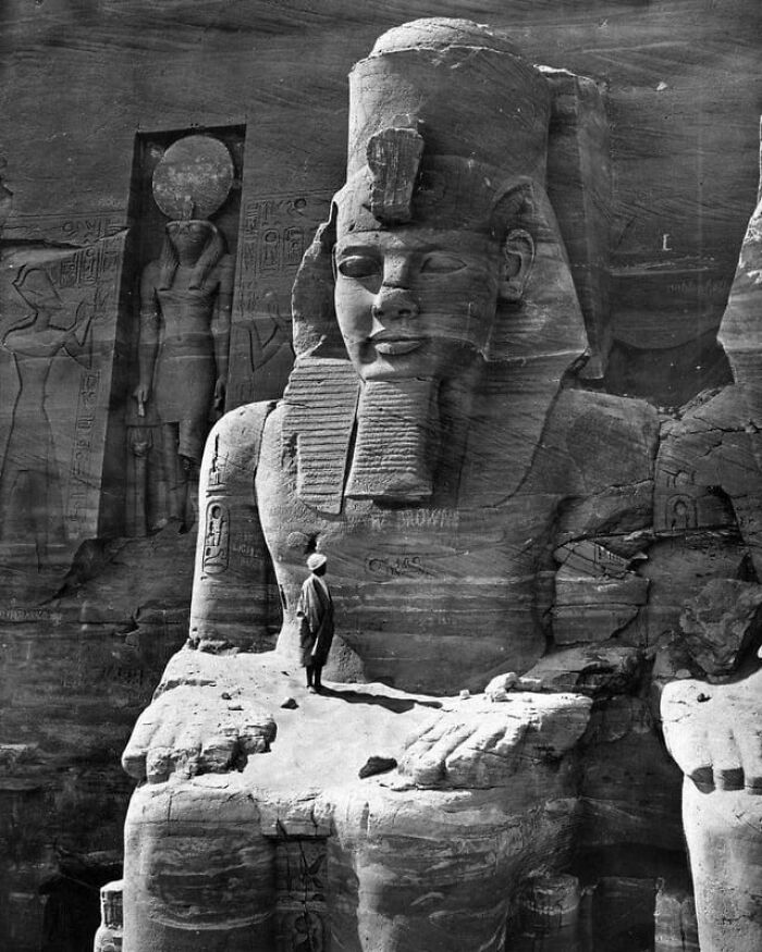 Black and white photo of colossal ancient Egyptian statue historical treasure