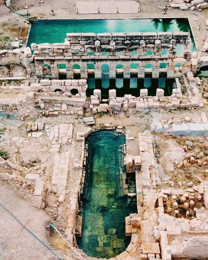 Ancient ruins with water reservoirs showcasing historical treasures