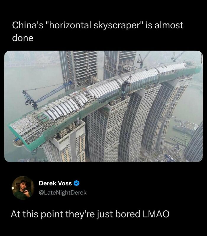 Image of an unsettling, dark and depressing story showing Chinas horizontal skyscraper under construction, an architectural marvel.
