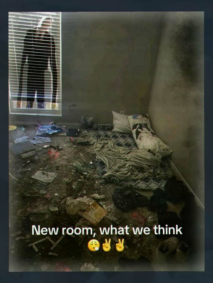 A chaotic and unhinged pic of a messy room with a figure looking in through blinds. Text: New room, what we think. 😩✌️