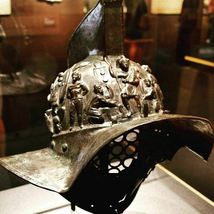 Ancient Roman helmet with intricate relief carvings historical treasure