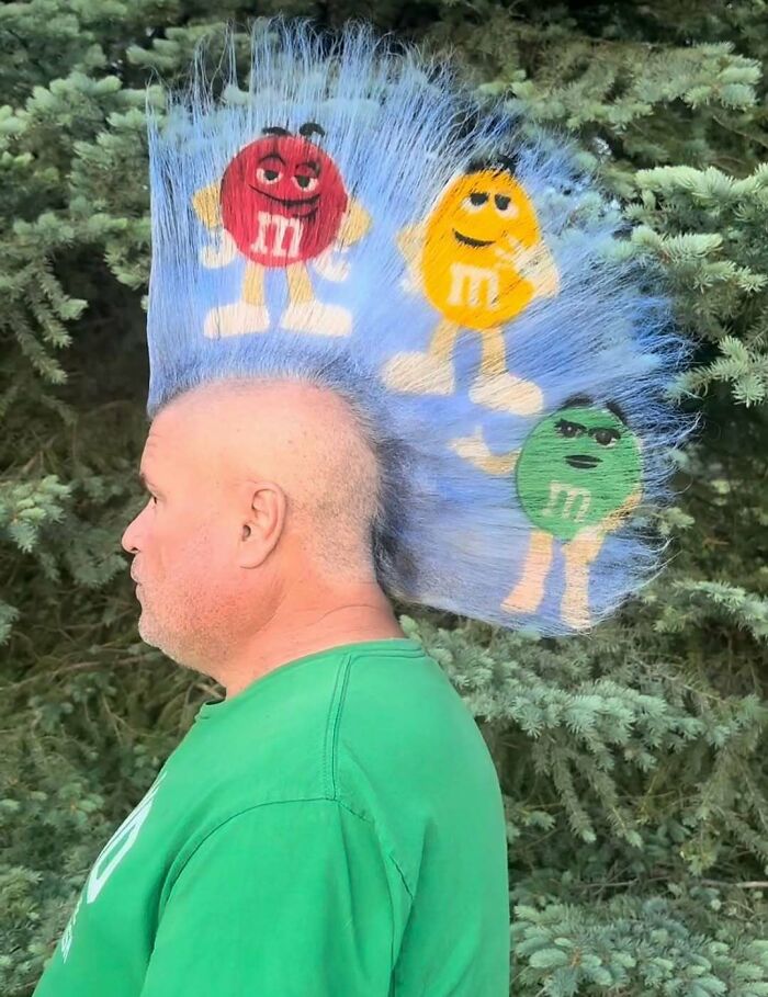 Man with a mohawk styled with colorful M&M's characters in his hair cursed images