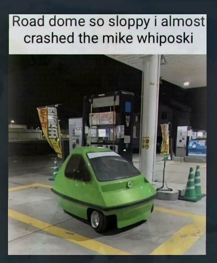 A chaotic and unhinged pic of a small, green, egg-shaped vehicle at a gas station with humorous text.