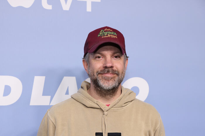 Jason Sudeikis smiling at a Ted Lasso promotional event Jason Sudeikis smiling at a Ted Lasso promotional event