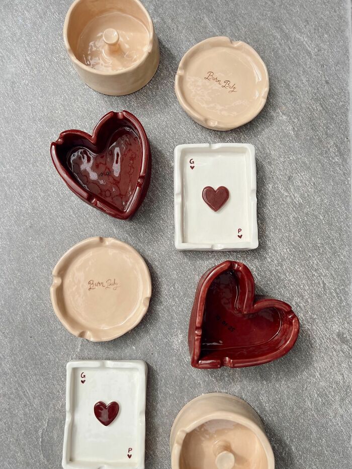 Heart and card-themed ceramic ashtrays for unique interior design accents