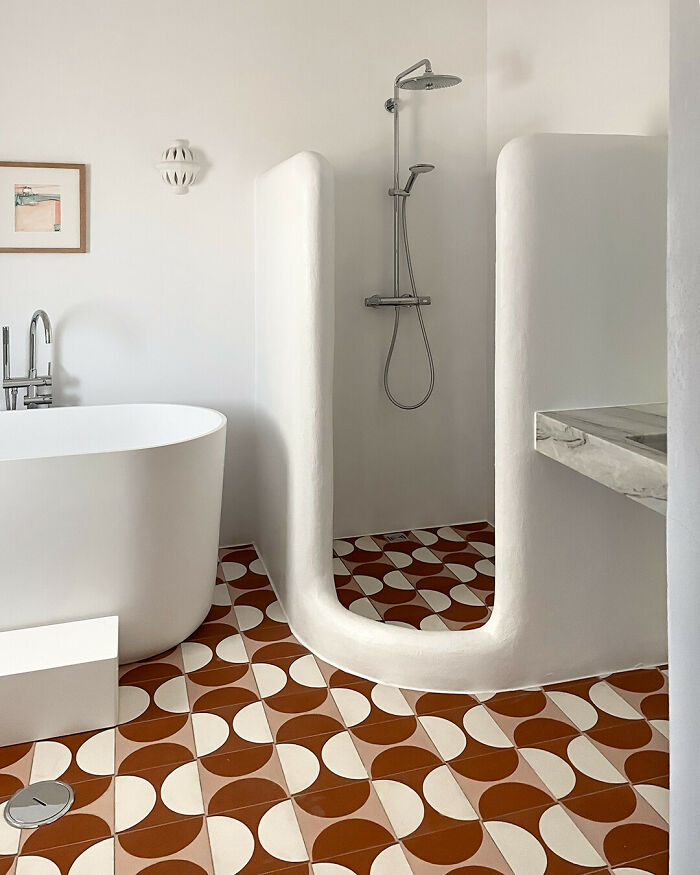 Modern bathroom with patterned tile floor and sleek interior design ideas for space upgrade
